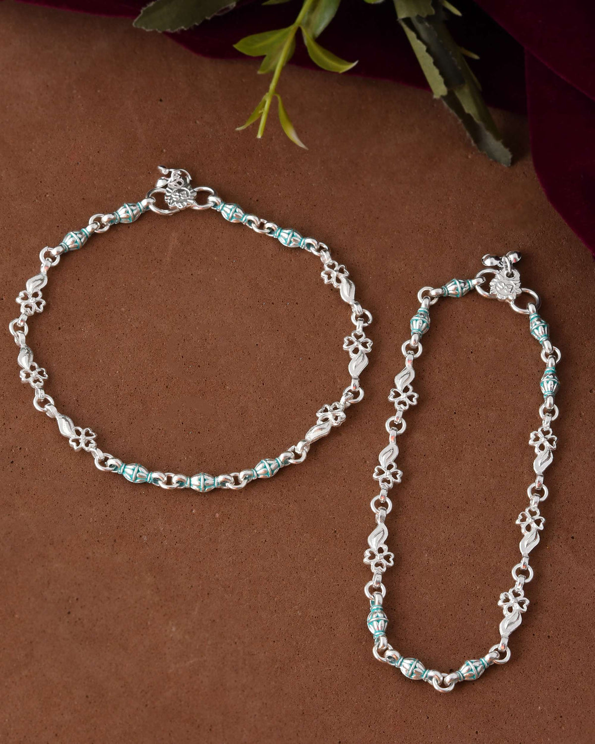 Jewels Nest Set of 2 Silver-Plated Anklets with Green Beads & Leaf Motifs | Grocsy