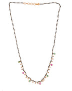 Jewels Nest Elegant Black Beads Mangalsutra with Green & Red Stone Drops – Silver Finish | Grocsy