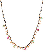 Jewels Nest Elegant Black Beads Mangalsutra with Green & Red Stone Drops – Silver Finish | Grocsy