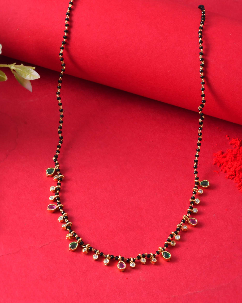 Jewels Nest Elegant Black Beads Mangalsutra with Green & Red Stone Drops – Silver Finish | Grocsy