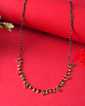Jewels Nest Elegant Black Beads Mangalsutra with Green & Red Stone Drops – Silver Finish | Grocsy