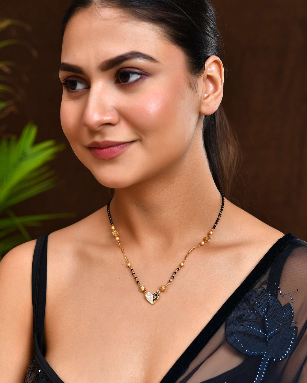 Jewels Nest Dual-Toned Artificial Stone Heart Mangalsutra with Golden Beads | Grocsy