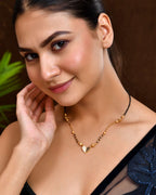 Jewels Nest Dual-Toned Artificial Stone Heart Mangalsutra with Golden Beads | Grocsy