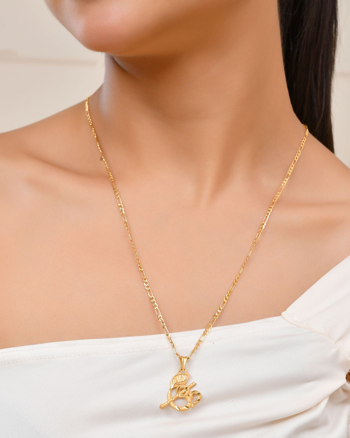 Jewels Nest Gold-Tone Flute Om Pendant Necklace For Women | Grocsy