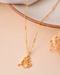 Jewels Nest Gold-Tone Flute Om Pendant Necklace For Women | Grocsy