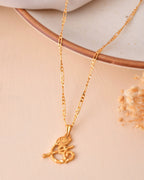 Jewels Nest Gold-Tone Flute Om Pendant Necklace For Women | Grocsy