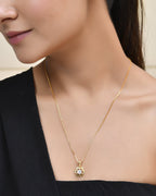 Jewels Nest Elegant Gold-Polished Floral Pendant with Sparkling Stone | Grocsy