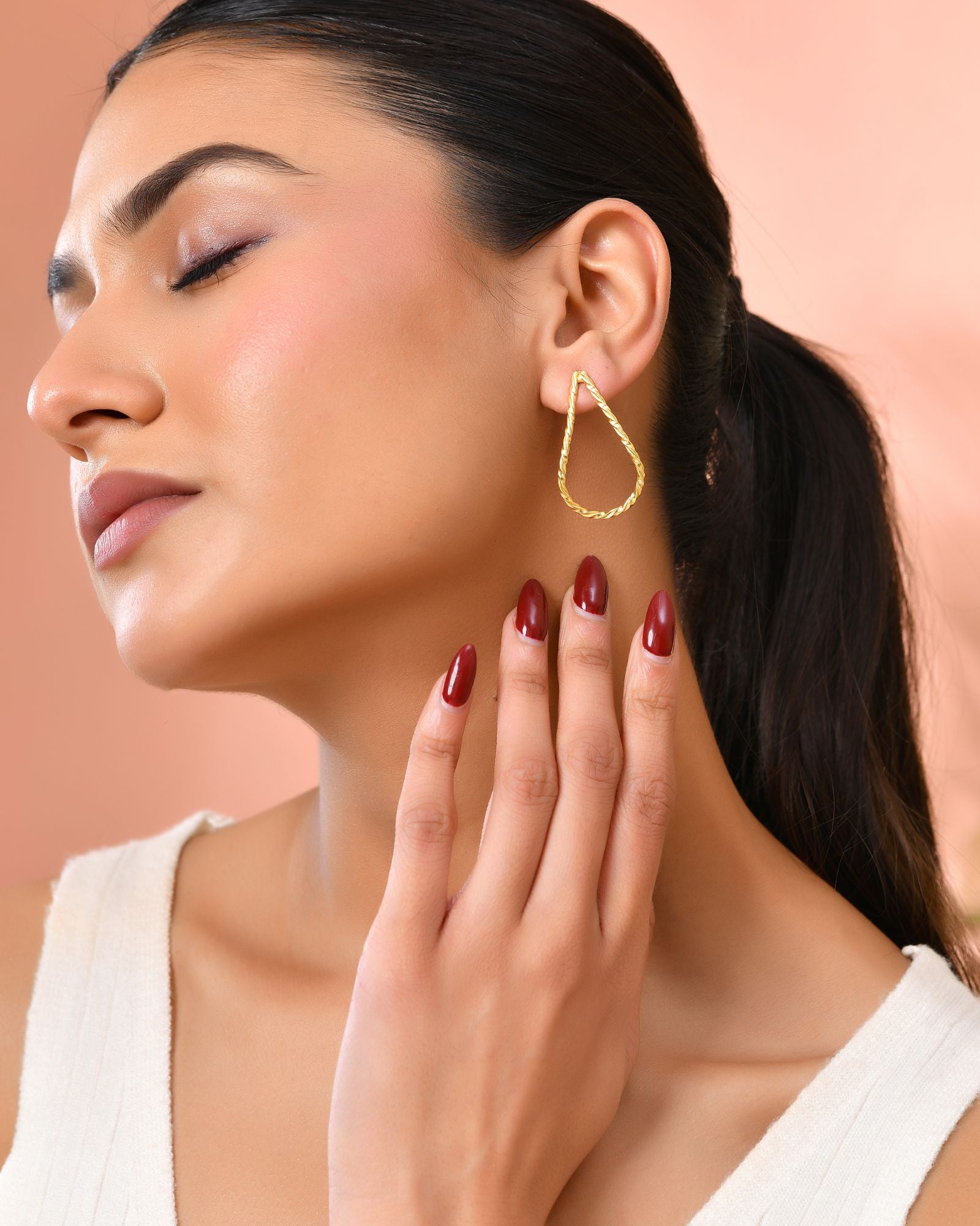 Jewels Nest Gold-Tone Twisted Teardrop Hoop Earrings For Women | Modern Minimal Jewellery | Grocsy