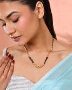 Jewels Nest Gold-Plated Black Beads Mangalsutra With Geometric Filigree Accent | Grocsy