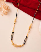 Jewels Nest Gold-Plated Black Beads Mangalsutra With Geometric Filigree Accent | Grocsy