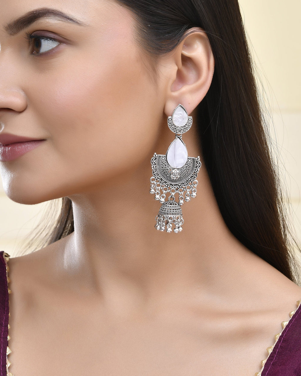 Jewels Nest Oxidized Silver Half Moon Jhumka Earrings with Intricate Design