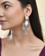 Jewels Nest Oxidized Silver Half Moon Jhumka Earrings with Intricate Design