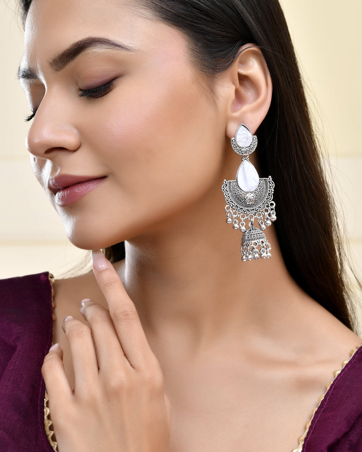 Jewels Nest Oxidized Silver Half Moon Jhumka Earrings with Intricate Design
