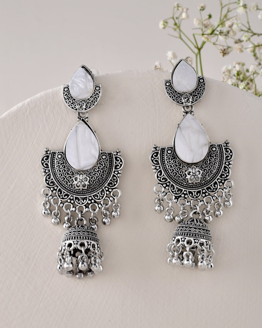 Jewels Nest Oxidized Silver Half Moon Jhumka Earrings with Intricate Design