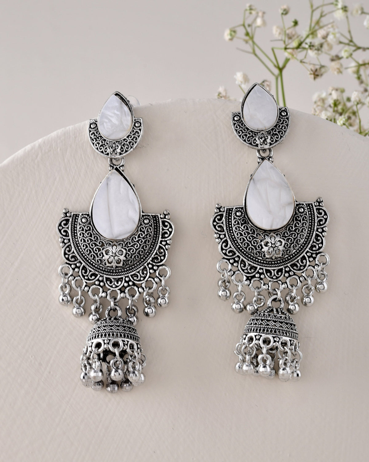 Jewels Nest Oxidized Silver Half Moon Jhumka Earrings with Intricate Design