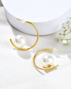 Jewels Nest Golden Halo Pearl Hoops | Grocsy