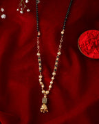 Jewels Nest Graceful Gold-Polished Black Bead Mangal Sutra with Intricate Pendant | Grocsy