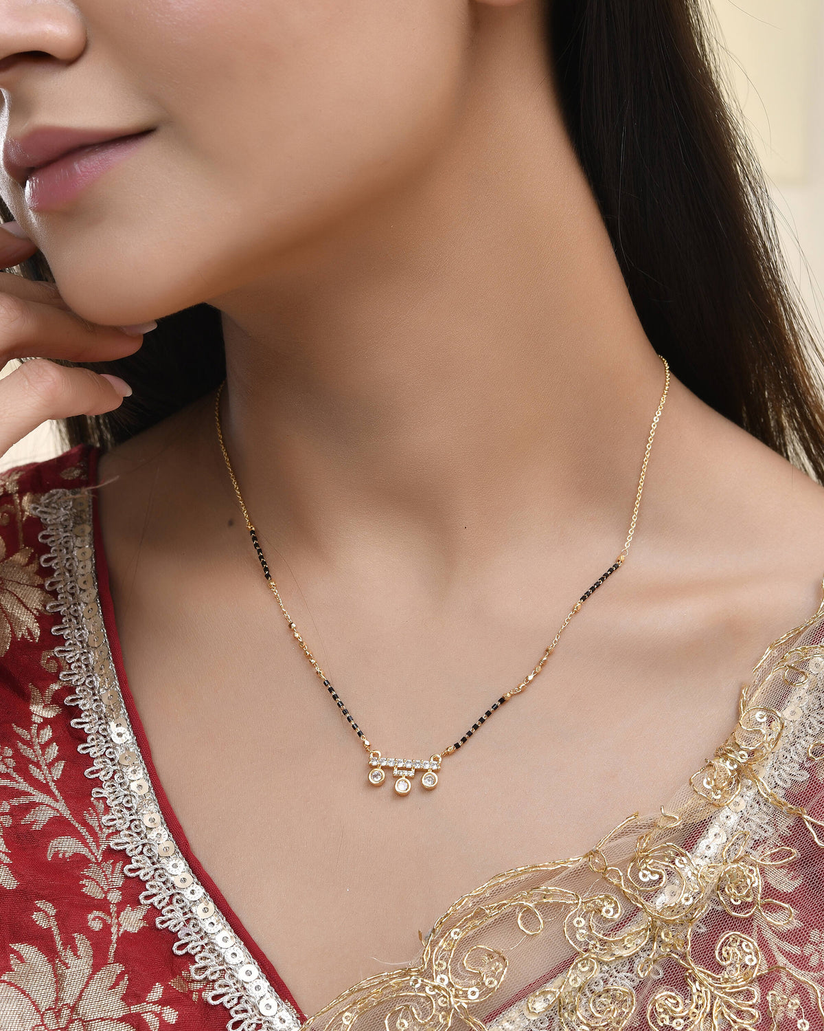 Jewels Nest Sleek Crystal Drop Gold-Polished Mangal Sutra | Grocsy