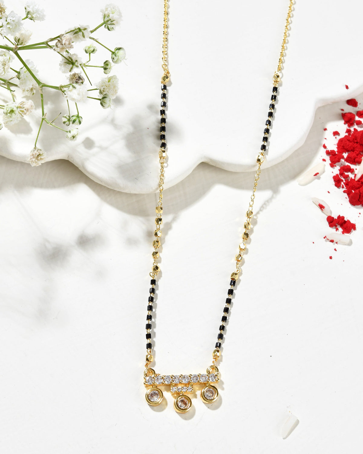 Jewels Nest Sleek Crystal Drop Gold-Polished Mangal Sutra | Grocsy