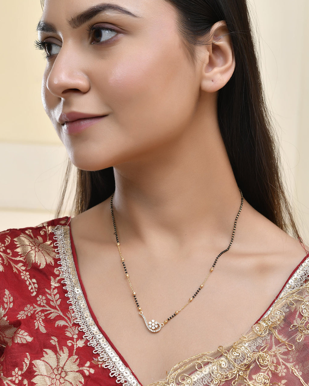 Jewels Nest Elegant Swirl Gold-Polished Mangal Sutra | Grocsy
