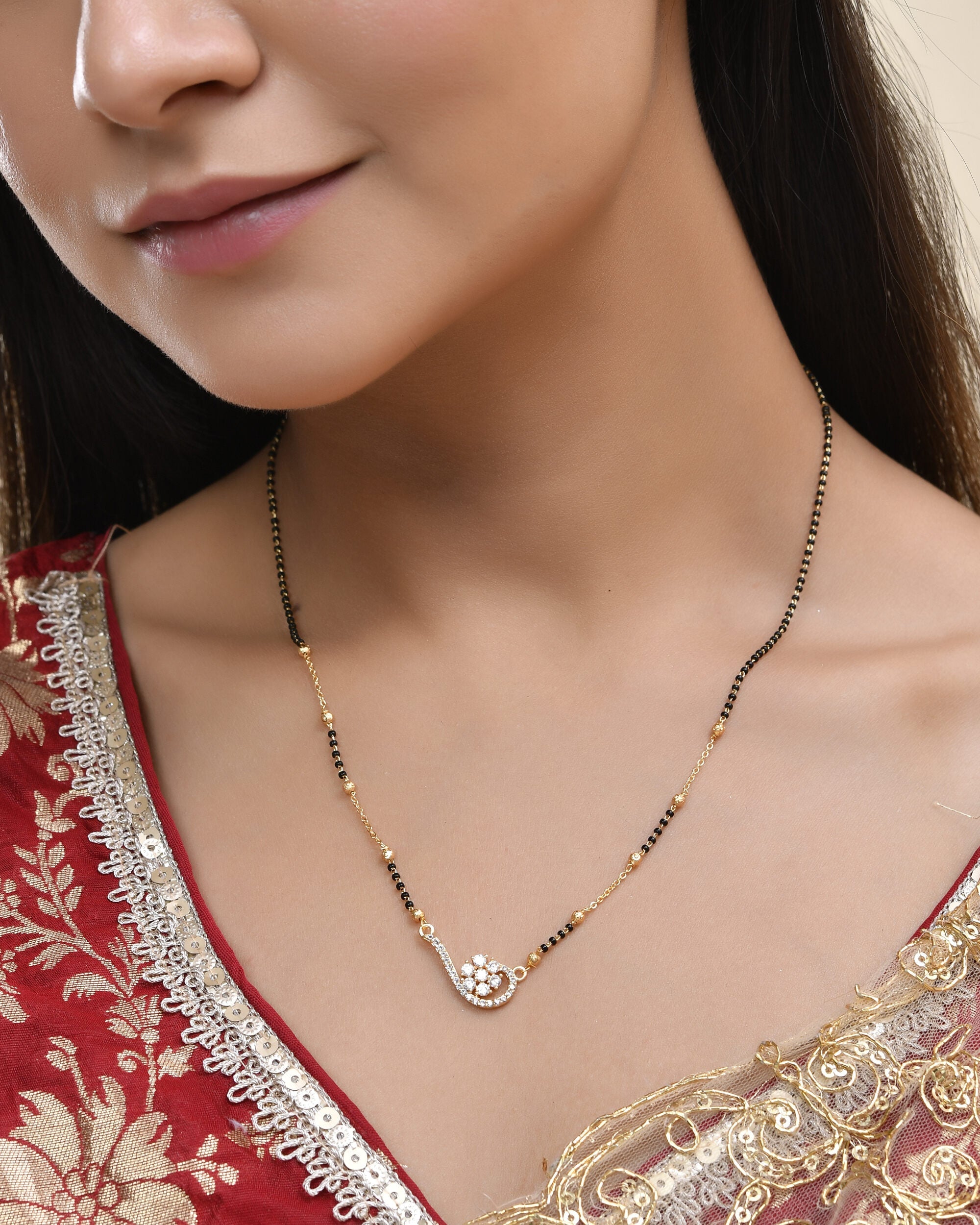 Jewels Nest Elegant Swirl Gold-Polished Mangal Sutra | Grocsy