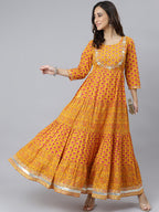Janasya Women's Mustard Cotton Floral Print Flared Kurta | Grocsy