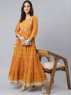 Janasya Women's Mustard Cotton Floral Print Flared Kurta | Grocsy