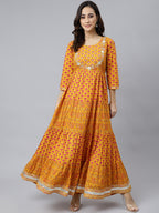 Janasya Women's Mustard Cotton Floral Print Flared Kurta | Grocsy
