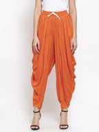 Jompers Women Orange Solid Dhoti | Grocsy