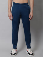 Jainish Men's Peacock Blue and White Striped Streachable Lycra Trackpants | Grocsy