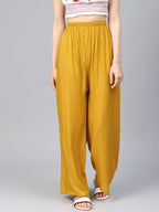 Jompers Women Mustard Solid Straight Palazzos | Grocsy