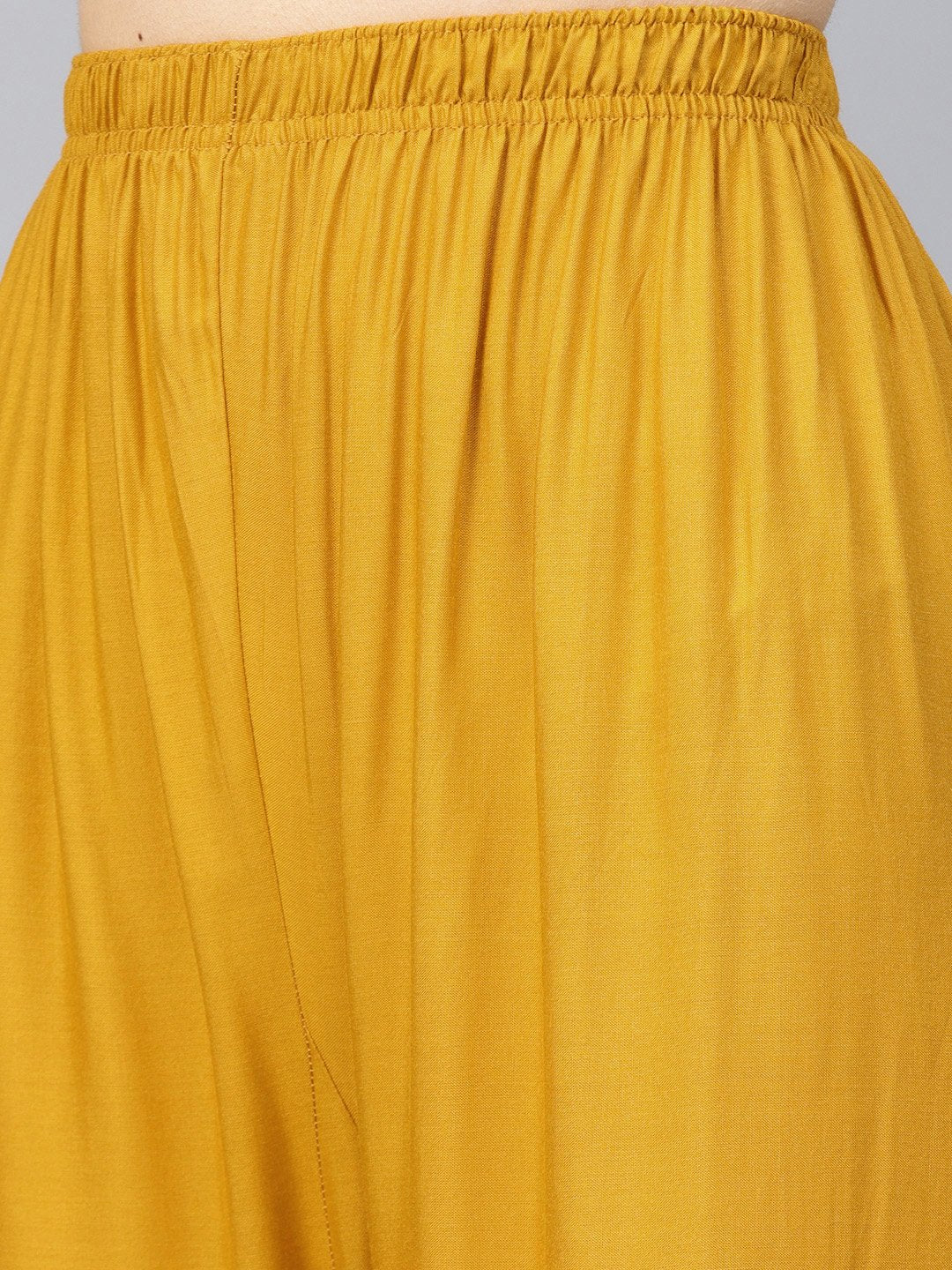 Jompers Women Mustard Solid Straight Palazzos | Grocsy