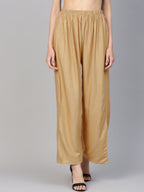 Jompers Women Beige Solid Straight Palazzos | Grocsy