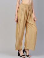 Jompers Women Beige Solid Straight Palazzos | Grocsy