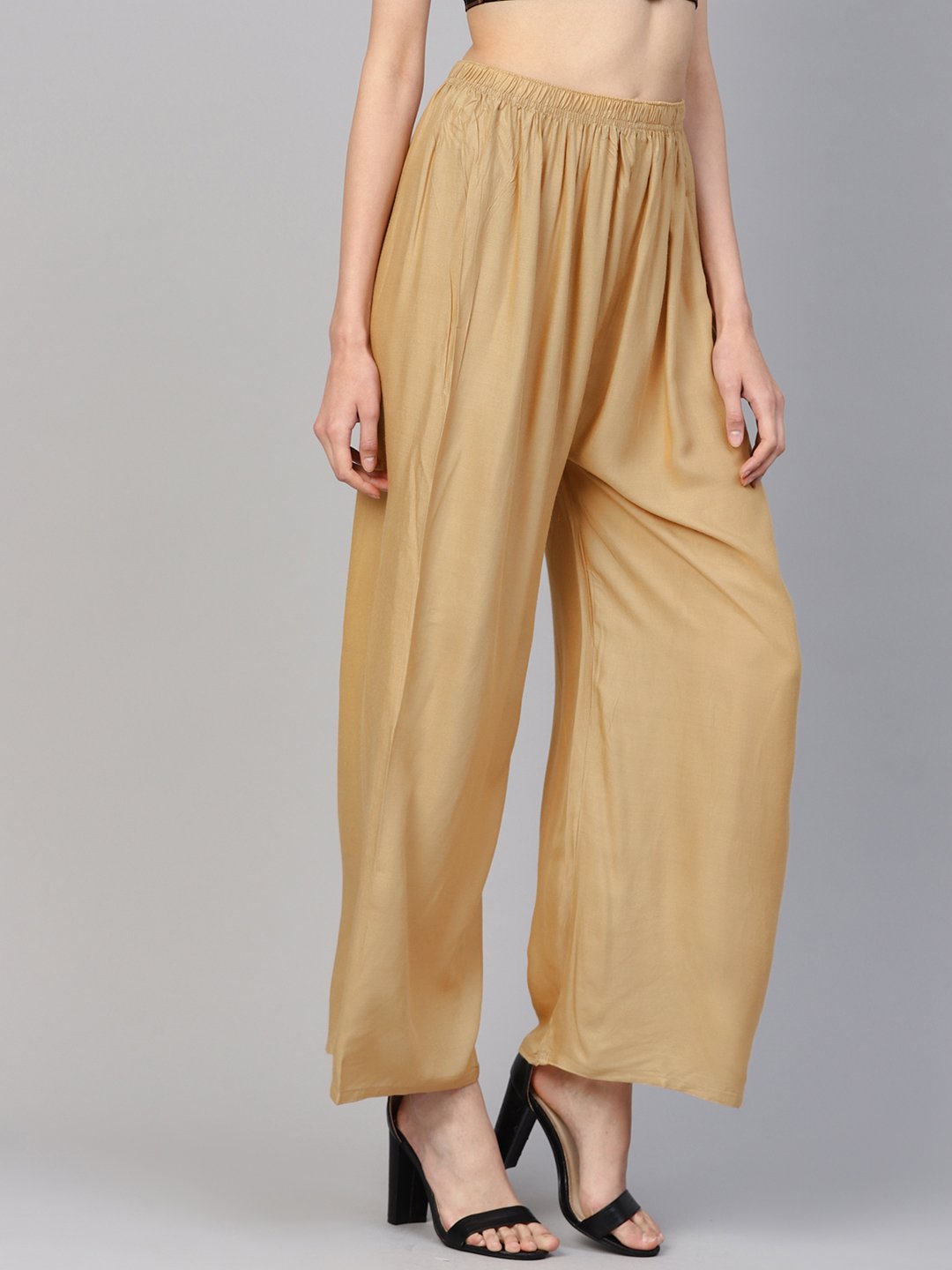 Jompers Women Beige Solid Straight Palazzos | Grocsy