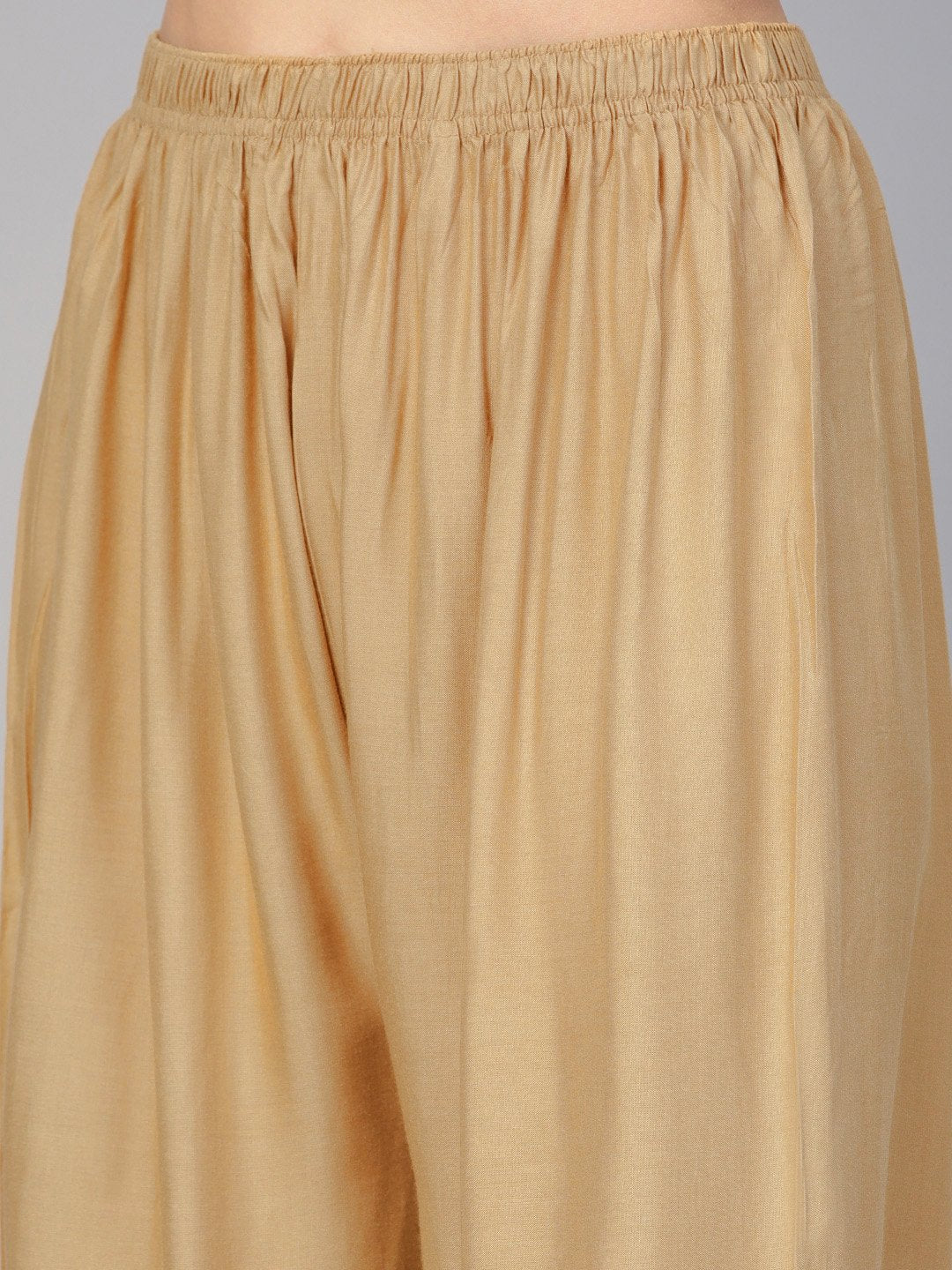 Jompers Women Beige Solid Straight Palazzos | Grocsy
