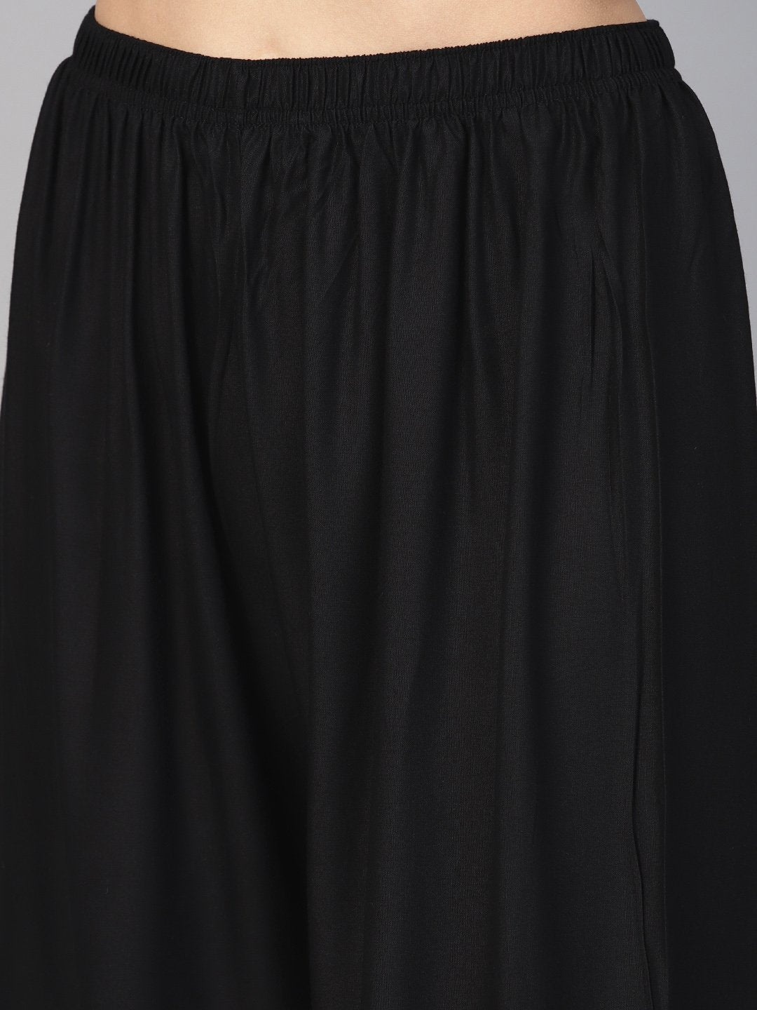 Jompers Women Black Solid Straight Palazzos | Grocsy