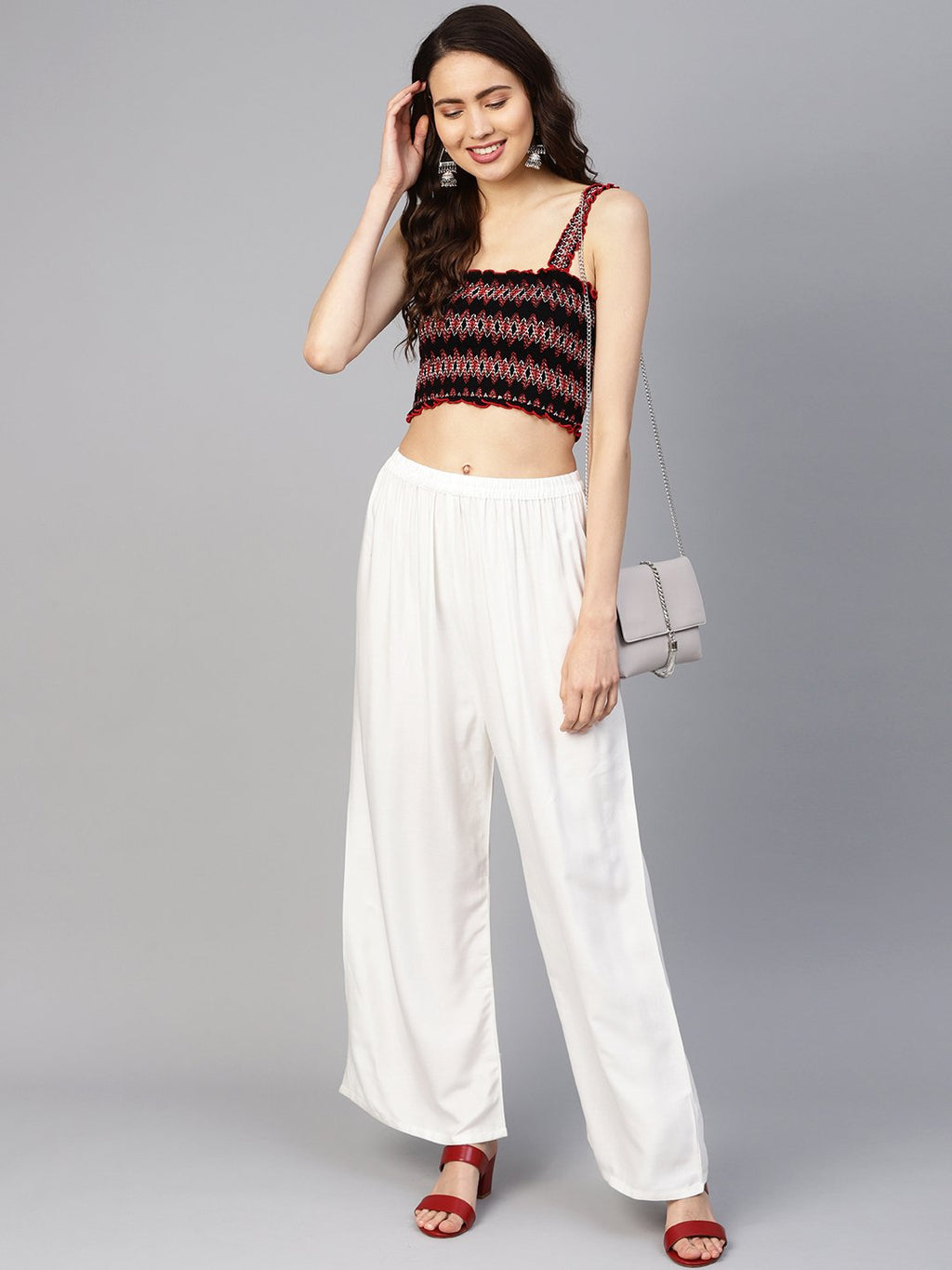 Jompers Women Off-White Solid Straight Palazzos | Grocsy