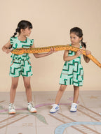 Snakes and Ladders Girls Green Table Print Jumpsuit from Siblings Collection | Grocsy