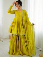 Evanik Yellow Mal Chanderi With Mirror & hand work Sharara Suit | Grocsy