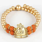 Om Pearl Bracelet Rakhi & Fruit N Nut Chocolates | Grocsy