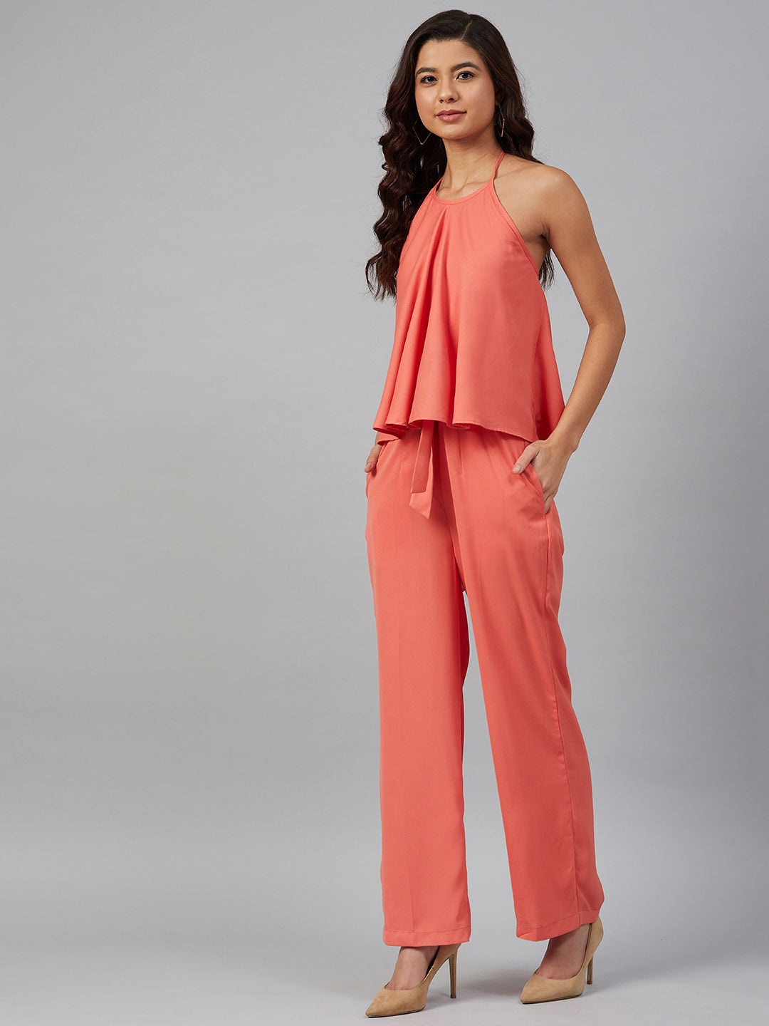 Jompers Women Peach-Coloured Solid Halter Neck Basic Jumpsuit | Grocsy