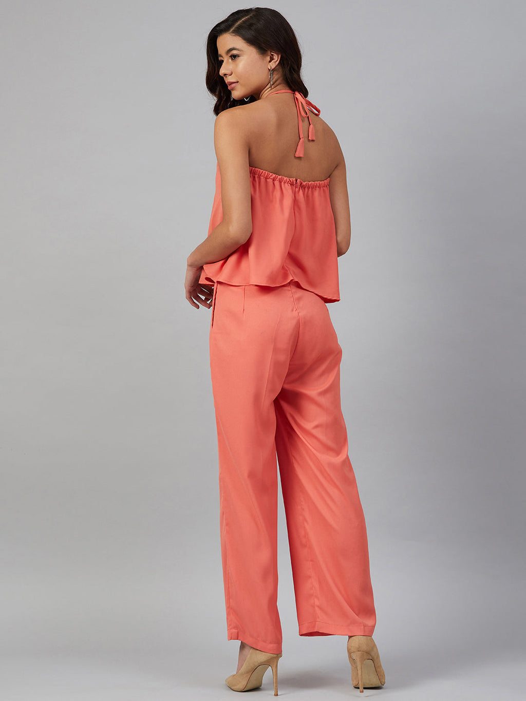 Jompers Women Peach-Coloured Solid Halter Neck Basic Jumpsuit | Grocsy