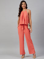 Jompers Women Peach-Coloured Solid Halter Neck Basic Jumpsuit | Grocsy