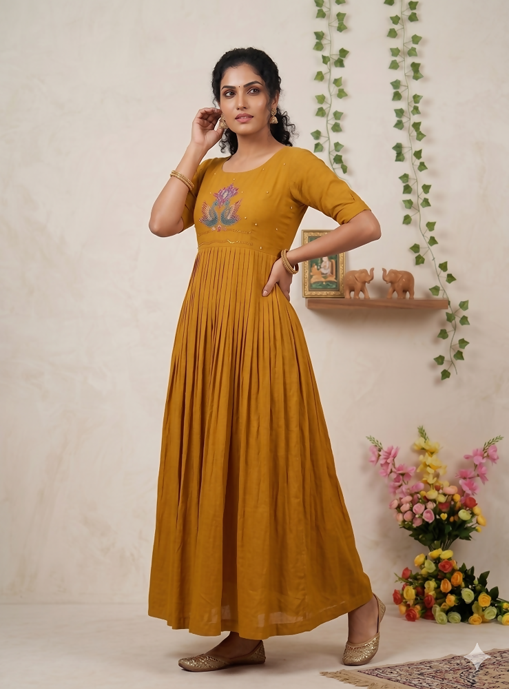 Teeya Creation Women's New Trendy Mustard Pleated Maxi Dress with Intricate Peacock Beadwork | Grocsy
