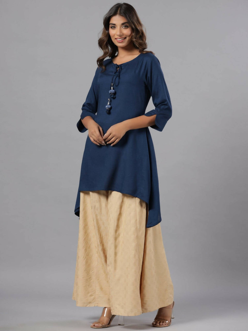 Juniper Women Indigo Rayon Solid Asymmetric Kurta | Grocsy