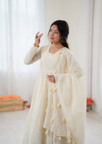 Teeya Creation Cream Kora Cotton Designer Embroidery Work long Gown | Grocsy