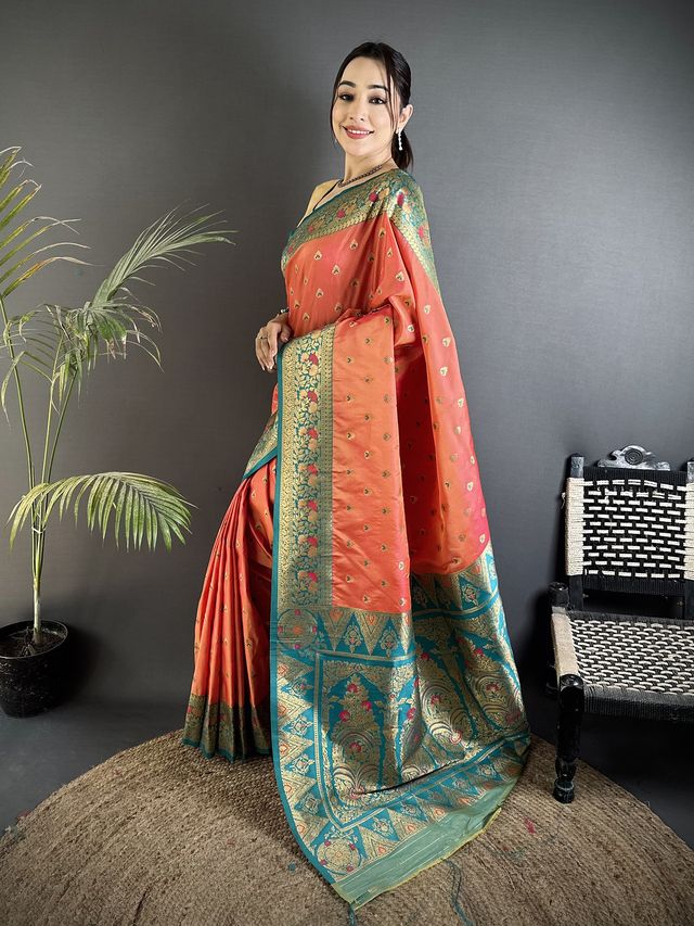 Elora Coral Pink Soft Silk Intricate Motifs Zari Weaving Banarasi Saree With Contrast Weaving Border | Grocsy