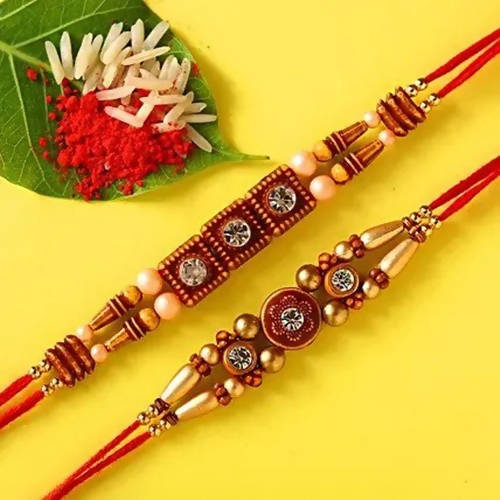2 Stone Work Rakhis and Choco Swiss Jingles Box | Grocsy