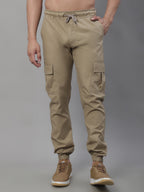 Jainish Men's Casual Cotton Solid Cargo Pants - Beige | Grocsy